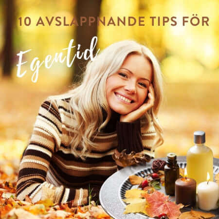 Bild på kvinna i höstlöv